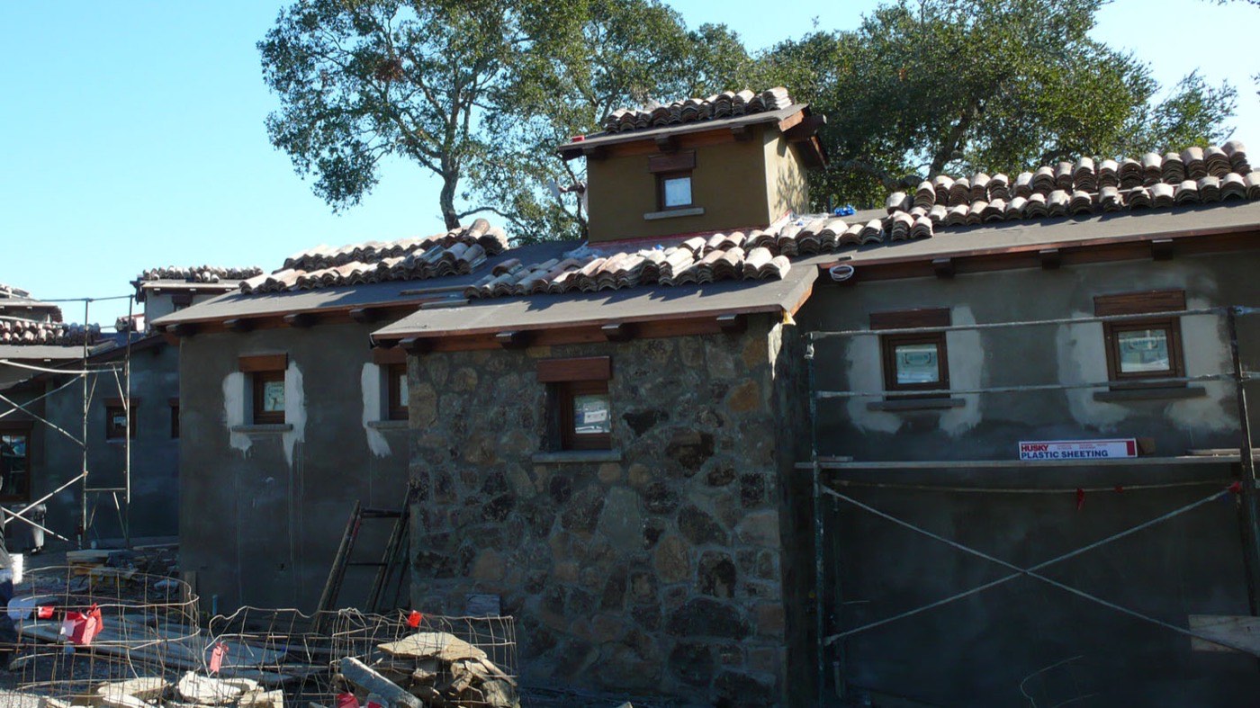 Concrete tile roofing installation in progress